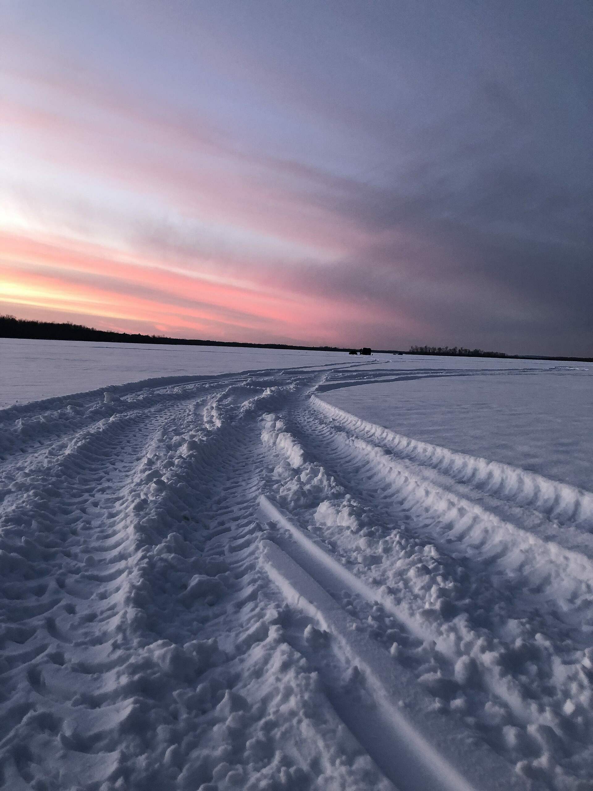MN winter sunset over bass lake in Grand Rapids, MN